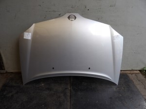 Nissan Almera Tino maska KL0