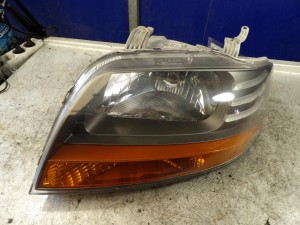 Chevrolet Aveo I lampa lewa przednia