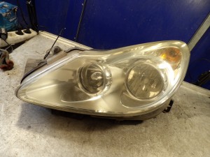 Opel Corsa D lampa przednia lewa 1,2B