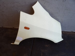 Honda Jazz II błotnik prawy lak. Y63