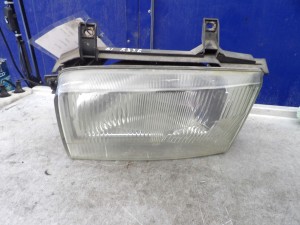 VW Transporter T4 lampa przednia lewa Hella