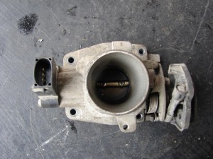 Przepustnica Ford Courier MK4 1,3B