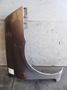 Błotnik prawy Renault Clio II lift lak. NV603